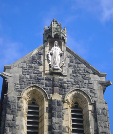 Statue on top of St Tudwal's Church, Barmouth